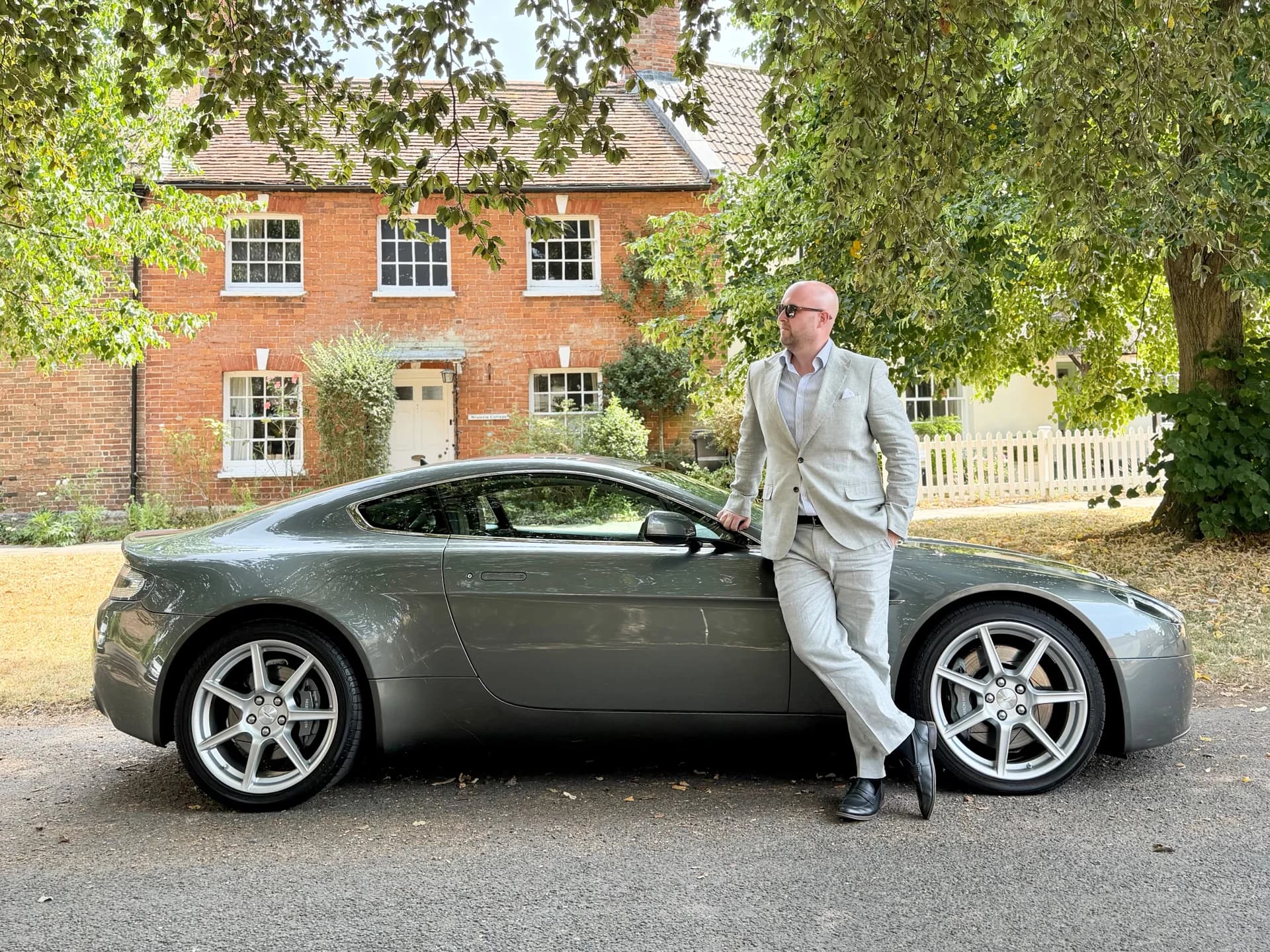 Self-employed estate agent outside a residential property in the UK